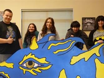 students with dragon painting